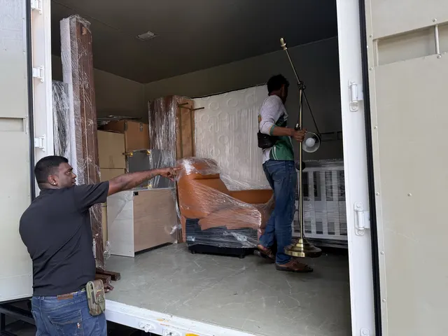 Loading wrapped furniture inside the lorry