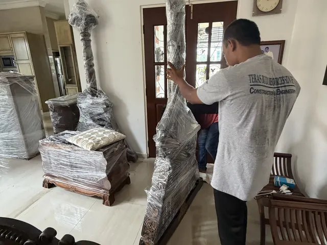 Mover wrapping a tall display cabinet
